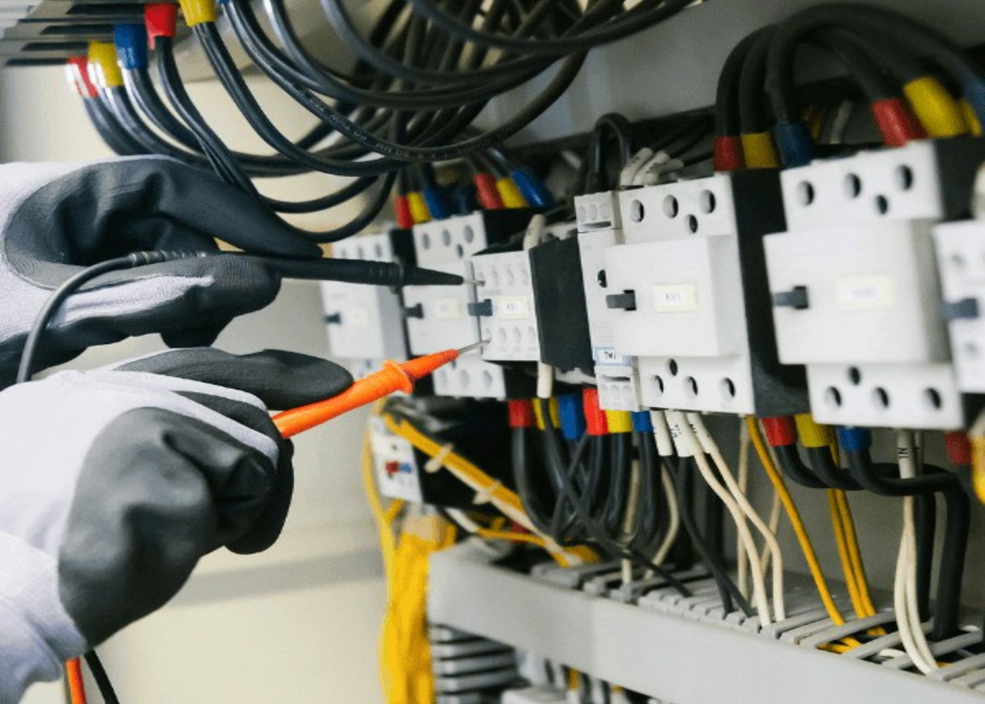 Electrician testing a consumer unit